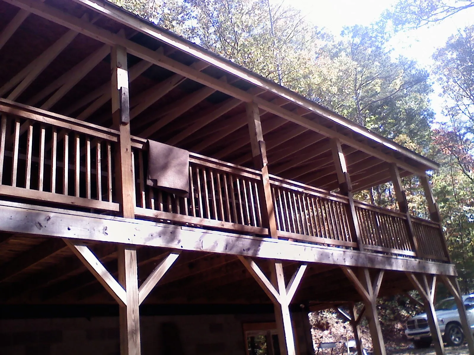 Timber framing under a new elevated porch and deck — Roof Leak Repair in Huddleston by Roofing Brothers
